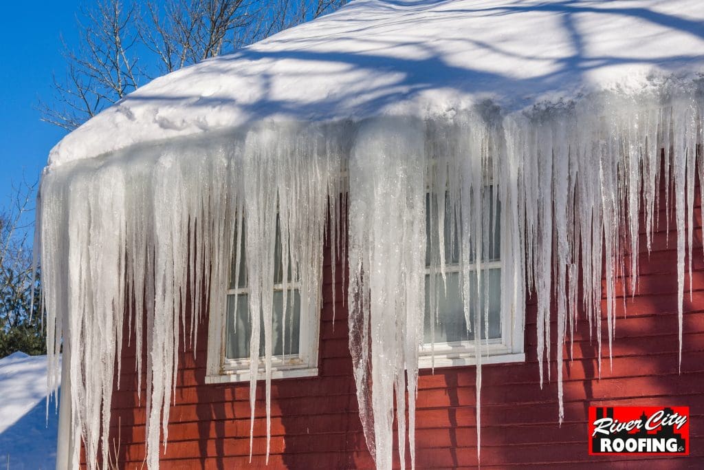 Snow and ice damaging the roof